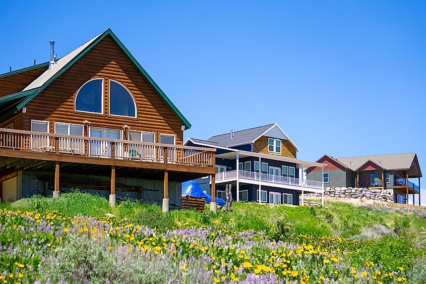 Bear Lake Cabin surrounded by lush greenery in the town of Garden City, Idaho.