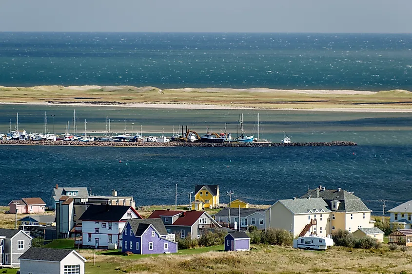 Houses, port and Sandy Hook dune at Havre-Aubert, Magdalen Islands