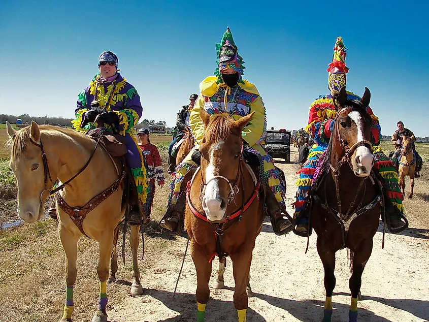 Three Cajun Mardi Gras horseback riders in Eunice, LA